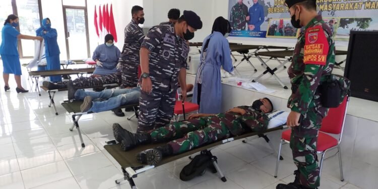 Memperingati Hari Dharma Samudra Satgas Yonif RK 732/Banau Turut Serta Dalam Bakti Sosial.