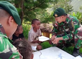 Satgas Yonif MR 412 Kostrad: Karena Kebahagiaanmu Adalah Kebahagiaan Indonesia.