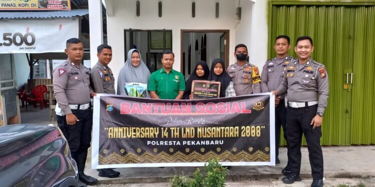 14 Tahun Pengabdian untuk Bangsa, Angkatan Bintara 2008 (LND) Polresta Pekanbaru Memberikan Bansos kepada Masyarakat.