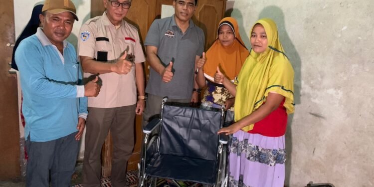 Gelar Bansos di Koto Tuo Kampar, TLCI Chapter#2 Riau Bagikan Sembako dan Kursi Roda.