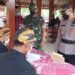 Danramil 02 Nguter Pastikan Hari H Pilkades di Desa Tanjung Berjalan Lancar, Tertib dan Aman.