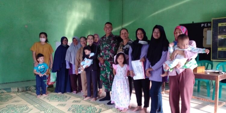 Wujudkan Balita Sehat, Babinsa Kemusu Dampingi Posyandu.