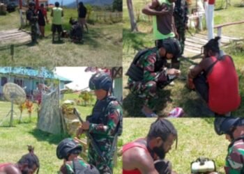 Satgas Yonif Raider 200/BN Bantu Perbaiki Mesin Rumput Warga