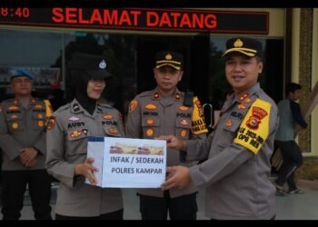Polres Kampar Infak dan Sedekah Kepada Korban Bencana Banjir
