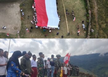 Kirab dan Pengibaran Bendera Merah Putih Raksasa Bukti Kedaulatan NKRI di Distrik Sinak