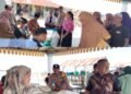 Bhabinkamtibmas Laksanakan Pengamanan Penyaluran Bantuan Cadangan Pangan Beras