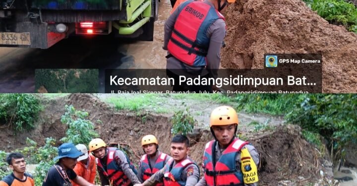 Personel Brimob Evakuasi dan Bersihkan Material Longsor di Padangsidempuan