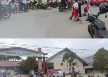 Untuk Mengurai Kemacetan Dipagi Hari Aipda Hengki Laksanakan Kegiatan Pengaturan Arus Lalu Lintas Di Depan Persekolahan
