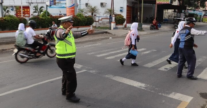 Antisipasi Kemacetan, Jajaran Polres Langkat Gelar Pengaturan Lalu Lintas di Pagi Hari