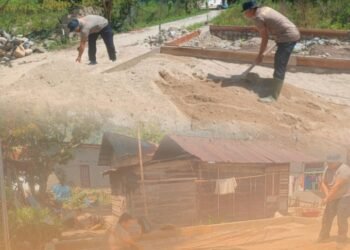 Gerimis Tak Surutkan Langkah Brimob Polda Sumut Bangun Hunian Warga Terdampak Banjir di Tapsel